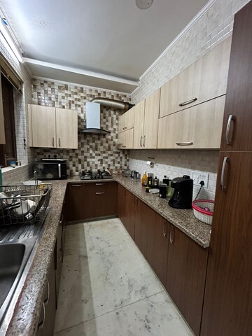 Kitchen in 2 BHK Apartment at Ansal Palam Triangle, Palam Vihar Extension – for Rent
