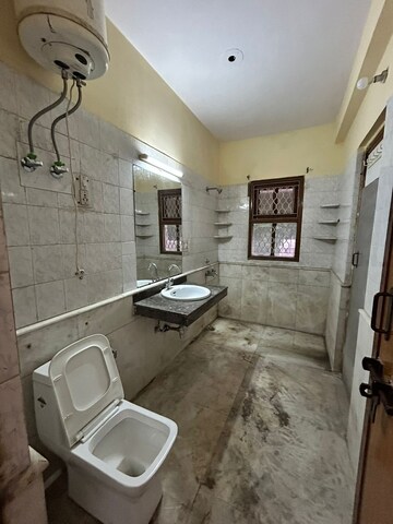 Bathroom in 2 BHK Apartment at AWHO Apartments, Sector 22 – for Rent