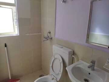 Bathroom in 1 BHK Apartment at Ansal Palam Triangle, Palam Vihar Extension – for Rent
