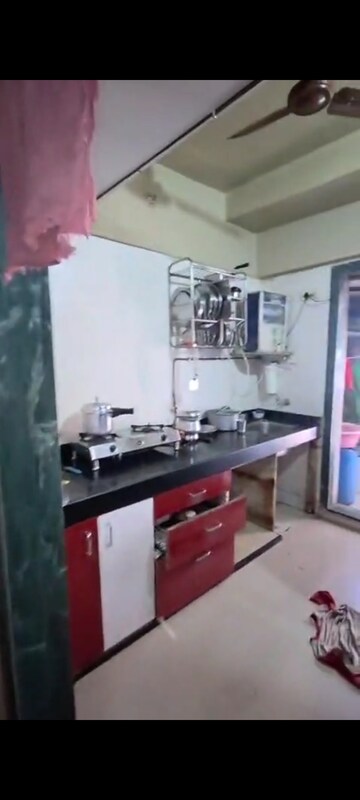 Kitchen in 2 BHK Apartment at Indralok Phase 6, Mira Road – for Sale