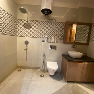 Bathroom in 4 BHK Builder Floor at Chattarpur – for Rent