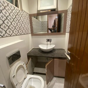 Bathroom in 4 BHK Builder Floor at Chattarpur – for Rent