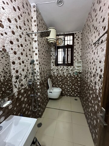 Bathroom in 2 BHK Builder Floor at Ansal Sushant Lok I, Sector 43 – for Rent