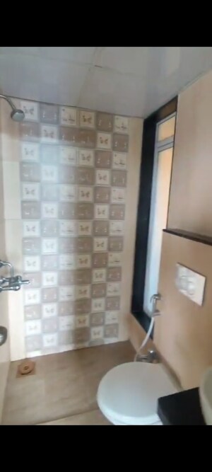 Bathroom in 1 BHK Apartment at JP North Imperia, Mira Road – for Rent