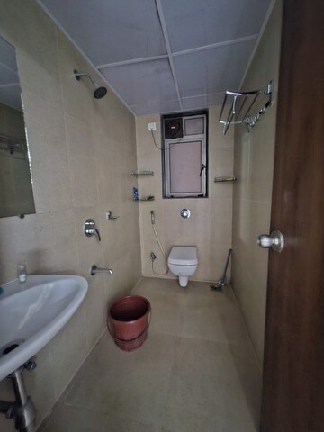 Bathroom in 2 BHK Apartment at Runwal Eirene, Balkum Pada – for Rent