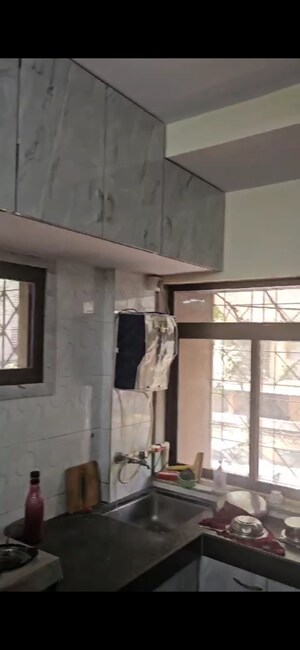 Kitchen in 1 BHK Apartment at Nagesh  Tower, Vishnu Nagar – for Rent