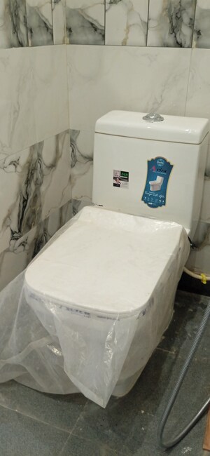 Bathroom in 2 BHK Apartment at Dashrath Puri – for Sale