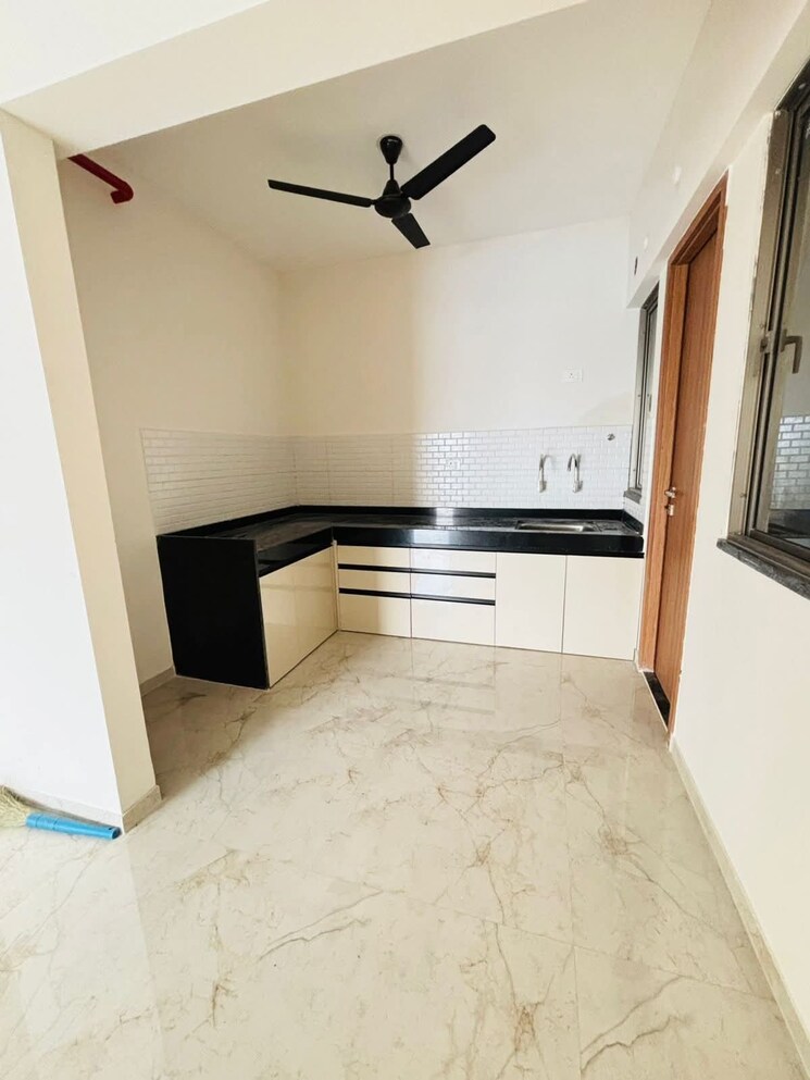 Kitchen, majestique-towers 2 Bedroom 825 Sq.Ft. Apartment In Kharadi Pune 9248303