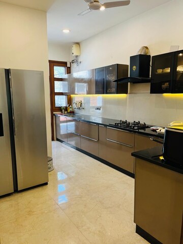 Kitchen in Studio Apartment at Maya Garden City, Lohgarh – for Rent
