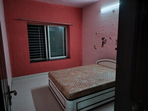 Bedroom in 2 BHK Apartment at Mirchandani Palms, Rahatani – for Sale