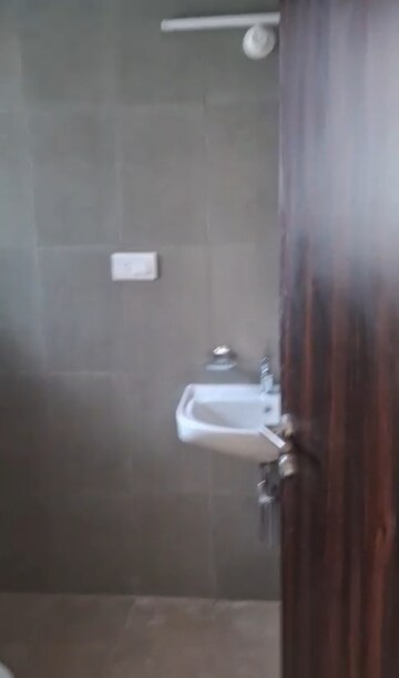 Bathroom in 3 BHK Apartment at Moti Nagar – for Rent