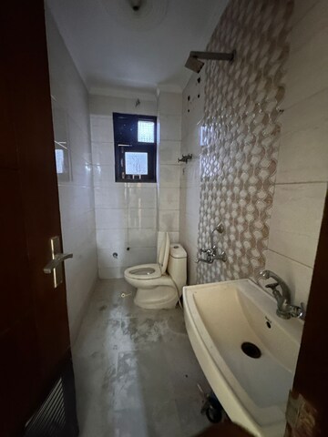 Bathroom in 2 BHK Builder Floor at Chattarpur – for Rent