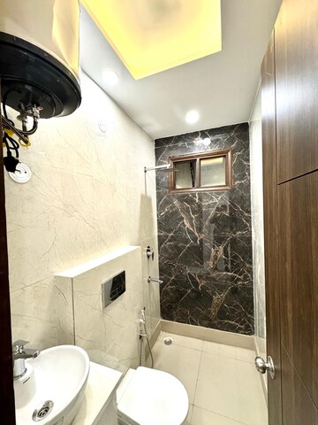 Bathroom in 2 BHK Apartment at Dashrath Puri – for Sale