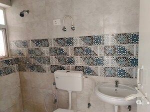 Bathroom in 3 BHK Apartment at Signature Global Golf Greens, Sector 79 – for Sale