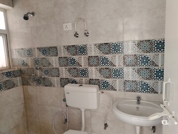 Bathroom in 3 BHK Apartment at Signature Global Golf Greens, Sector 79 – for Sale