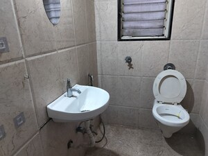 Bathroom in 2 BHK Apartment at Shiva Heights ll, Pimple Saudagar – for Rent