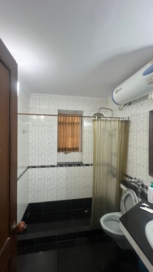 Bathroom in 2 BHK Builder Floor at Jungpura Extension – for Rent
