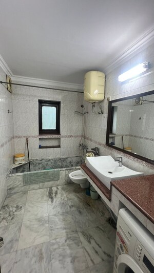 Bathroom in 3 BHK Builder Floor at Jungpura Extension – for Rent