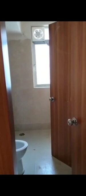 Bathroom in 2.5 BHK Apartment at Mahagun Moderne, Sector 78 – for Sale