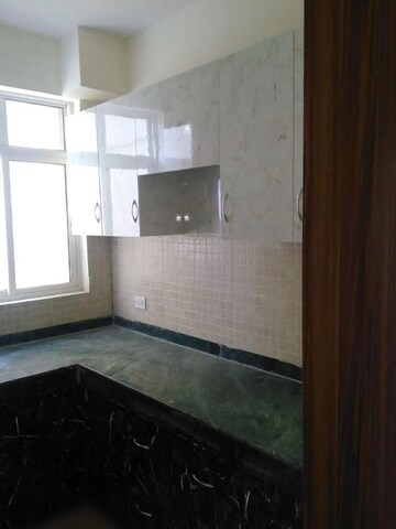 Kitchen in 3 BHK Apartment at Mahagun Moderne, Sector 78 – for Sale