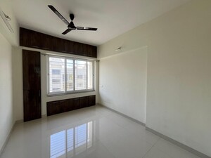 Bedroom in 2 BHK Apartment at Kumar Picasso, Hadapsar – for Rent