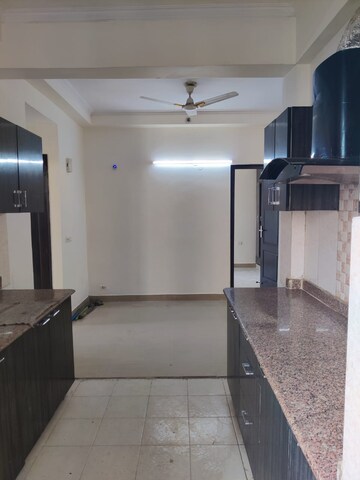 Kitchen in 3 BHK Apartment at Amrapali Silicon City, Sector 76 – for Rent