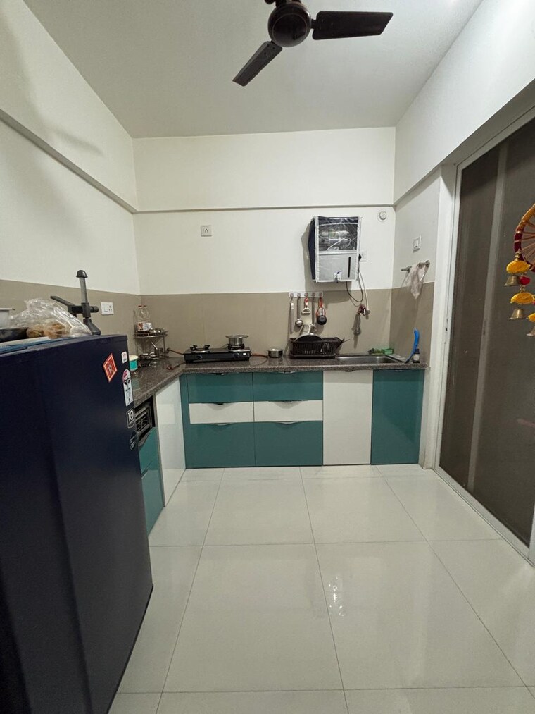 Kitchen, adi-w-57 2 Bedroom 750 Sq.Ft. Apartment In Wakad Pune 9249326
