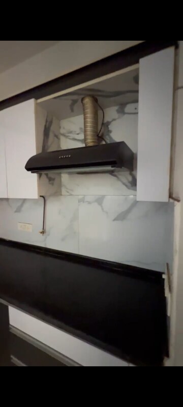 Kitchen in 2.5 BHK Apartment at Mahagun Mywoods, Sector 16c Greater Noida – for Sale
