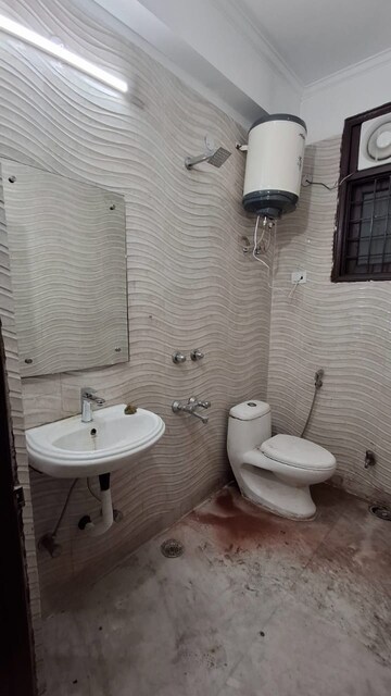Bathroom in 2 BHK Builder Floor at Freedom Fighters Enclave – for Rent