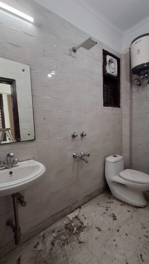 Bathroom in 2 BHK Builder Floor at Freedom Fighters Enclave – for Rent