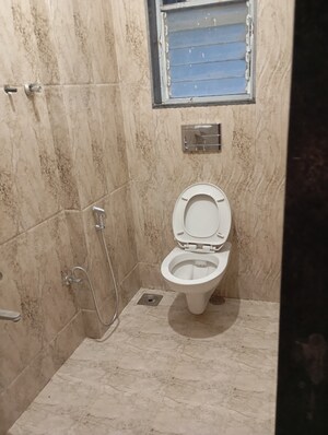 Bathroom in 2 BHK Apartment at Siv Akhand Anand, Andheri East – for Sale