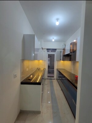 Kitchen in 2.5 BHK Apartment at Smart World Gems, Sector 89 – for Rent