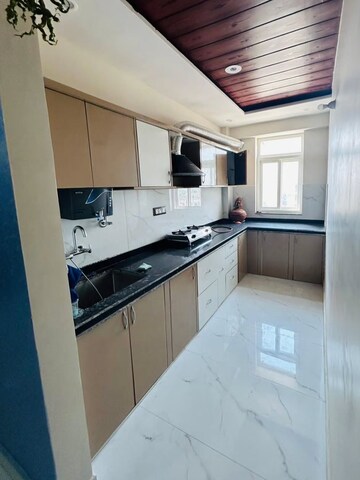 Kitchen in 3 BHK Apartment at Conscient Heritage Max, Sector 102 – for Rent