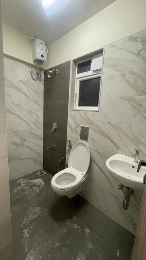 Bathroom in 2 BHK Apartment at Adityaraj Gurukripa CHS, Vikhroli East – for Rent