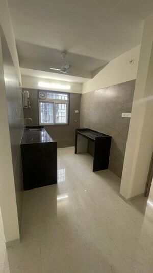 Kitchen in 2 BHK Apartment at Adityaraj Gurukripa CHS, Vikhroli East – for Rent