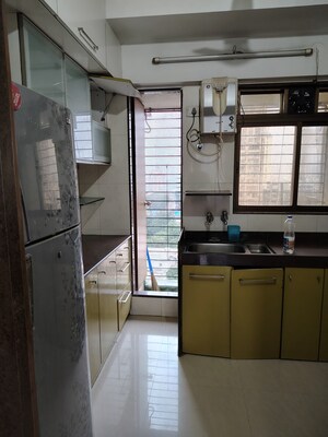 Kitchen in 2 BHK Apartment at Bharat Apartment Malad , Malad West – for Rent
