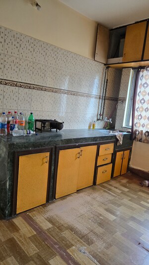 Kitchen in 1 BHK Apartment at Rahi Aangan CHS, Tingre Nagar – for Rent
