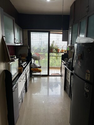 Kitchen in 3 BHK Apartment at Unique Twins Tower CHS, Kharghar Sector 20 – for Rent