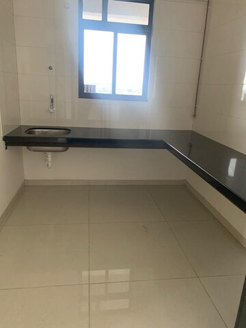 Kitchen in 2 BHK Apartment at Paranjape Broadway, Wakad – for Rent