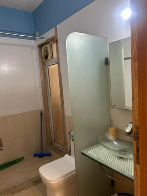 Bathroom in 1 BHK Apartment at Kishor Sukur Enclave A, Ghodbunder Road – for Rent