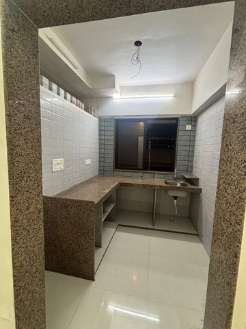 Kitchen in 1 BHK Apartment at Rajkamal Heights, Parel – for Rent