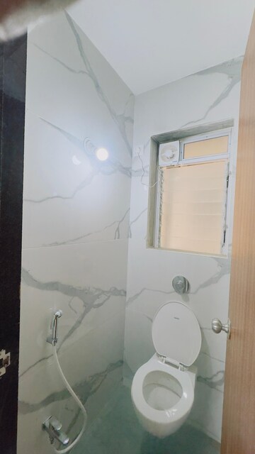 Bathroom in 1 BHK Apartment at Raunak Delight, Owale – for Rent
