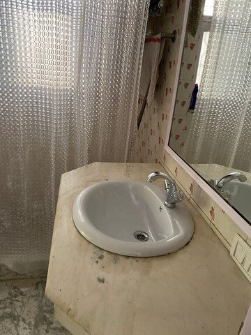 Bathroom in 2 BHK Builder Floor at Boutique Residential Apartments C-253, Defence Colony – for Rent
