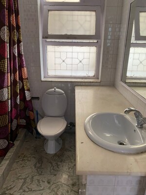 Bathroom in 2 BHK Builder Floor at Boutique Residential Apartments C-253, Defence Colony – for Rent