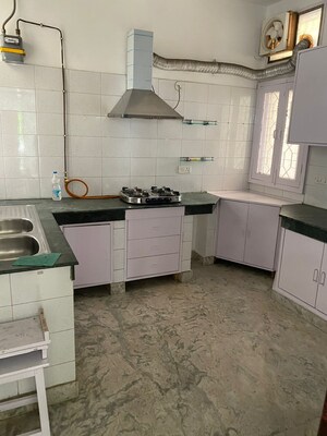 Kitchen in 2 BHK Builder Floor at Boutique Residential Apartments C-253, Defence Colony – for Rent