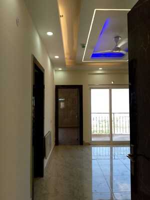 Building Lobby in 2 BHK Apartment at Amrapali Enchante, Tech Zone 4 Greater Noida – for Rent