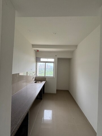 Kitchen in 2 BHK Apartment at Puraniks City Reserva, Ghodbunder Road – for Sale