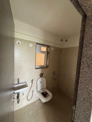 Bathroom in 2 BHK Apartment at Puraniks City Reserva, Ghodbunder Road – for Sale