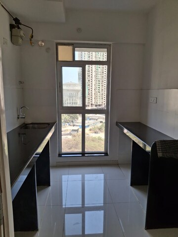 Kitchen in 1 BHK Apartment at Puranik City Reserva, Ghodbunder Road – for Rent