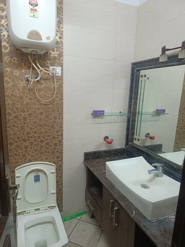 Bathroom in 3 BHK Builder Floor at Kalkaji – for Rent